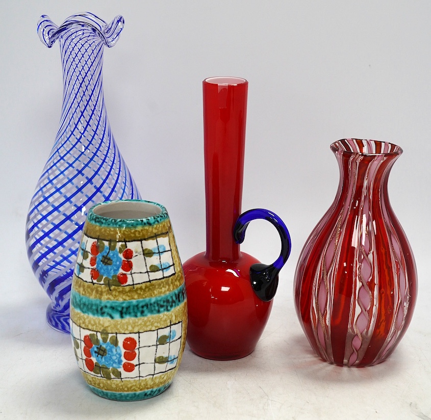 A Murano glass vase with inset copper aventurine, two other European glass vases and a similar ceramic vase, tallest 24cm. Condition - good